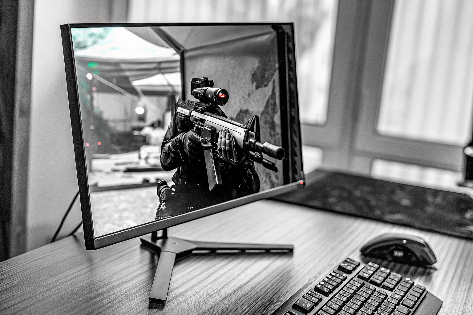 Ein detailreicher Gaming-Monitor auf einem Schreibtisch, ideal für FPS-Spiele. Gaming-Monitor für FPS-Spiele